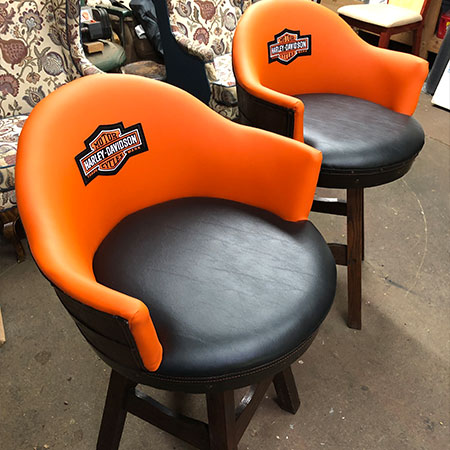 Harley Davidson logo on bar stool using quality furniture reupholstery by HAMS Upholstery in Aston, PA